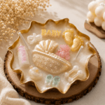 Baby shower keepsake candle with baby themed decorations